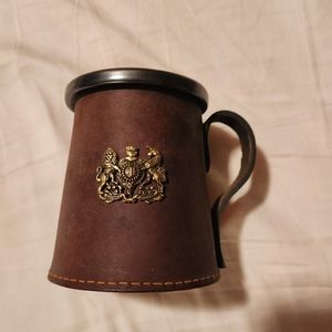 Metal (pewter?) and leather mug